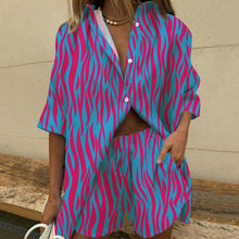 Last inn bildet i Galleri-visningsprogrammet, Uformelt sett med kortermet skjorte og shorts med brede ben