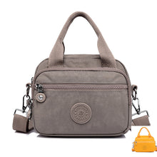 Last inn bildet i Galleri-visningsprogrammet, Funksjonell håndveske i ensfarget flerrom