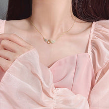 Last inn bildet i Galleri-visningsprogrammet, Skinnende halskjede med englevinger