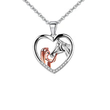 Last inn bildet i Galleri-visningsprogrammet, Kjede til jente og hest