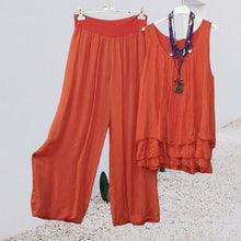 Last inn bildet i Galleri-visningsprogrammet, Todelt sett med ermeløs topp og bukse med brede ben for damer