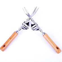 Last inn bildet i Galleri-visningsprogrammet, Hagearbeider