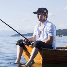 Last inn bildet i Galleri-visningsprogrammet, Baseballcaps med lyd