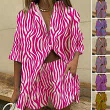 Last inn bildet i Galleri-visningsprogrammet, Uformelt sett med kortermet skjorte og shorts med brede ben