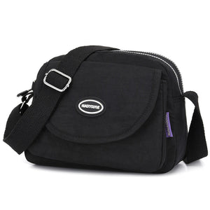 Vanntett nylon skulderveske for damer