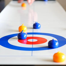 Last inn bildet i Galleri-visningsprogrammet, Curlingspill på bord
