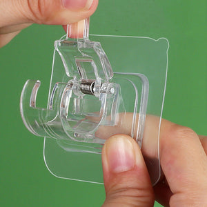 Transparent klemme for oppheng av stang