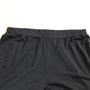 Pluss størrelse ensfarget topp og shorts